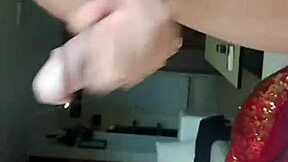 dude, check this hot guy stroking his massive cock right by the window in public