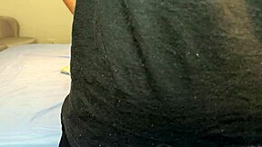 sexy bubble butt strains tight gym clothes over monster cock