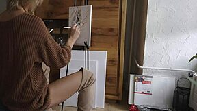 cute blonde babe paints her pretty pussy flower wearing sexy boots glasses