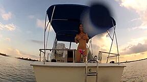 woman flashes huge boobs wildly on public boat deck outdoors