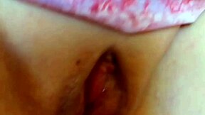 mature wife spreads her huge plump shaved pussy lips wide