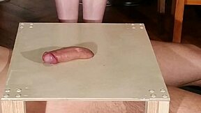 mistress stomps slave cock bare feet then footjobs him hard