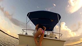woman flashes huge boobs wildly on public boat deck outdoors