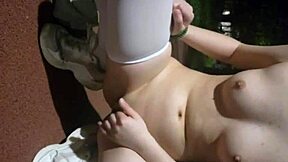 Chinese babe strips naked outdoors exposing body for intense masturbation