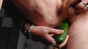 Old dutch european german granny fucks her hairy pussy with cucumber