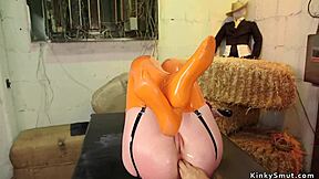 wanna see this latex dom fist her huge tits slave?