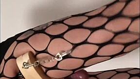 Ladyboy strokes monster cock in tight miniskirt pantyhose