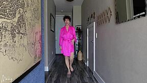 Naughty mature flashes her big clit and wet pussy lips before ripping clothes off