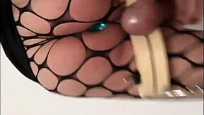 Ladyboy strokes monster cock in tight miniskirt pantyhose