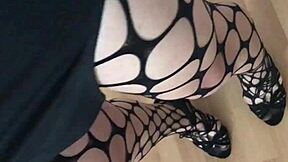 Ladyboy strokes monster cock in tight miniskirt pantyhose