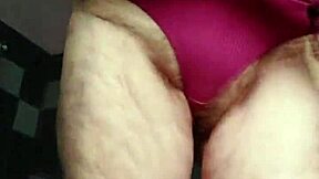 granny stuffs dildo deep in her hairy wet slit