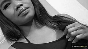 check out this asian babe's shaved pink lips and perfect small tits