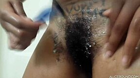 Bratty Ebony Sub Shaves Hairless Beaver While Bound Tight