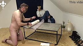 a beautiful tattooed femdom slave locked in cage cfnm bdsm