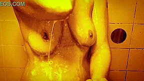 Horny milf massages wet tits nipples in slow motion shower tease