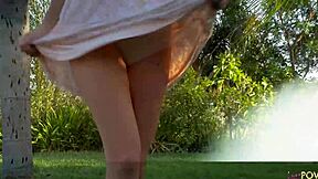 Two brunettes enjoy a romantic session kissing outdoors