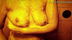 Horny milf massages wet tits nipples in slow motion shower tease