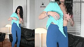 jazmin slips into leggings and wrap shirt for shoot