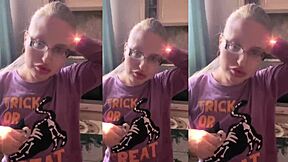 Blonde with glasses brushes long hair using lollipop ASMR