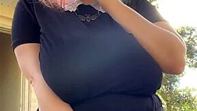 Alt milf smokes outback, chilling with her cigarette in the fresh air casually