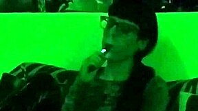 Beth Kinky Goth Domina's Seductive Smoke in Eerie Green Light