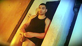 Muscular hunk's huge cock hard against sexy wall 😏