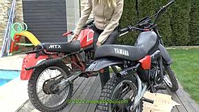 check out these vintage babes revving enduro dirt bikes in full trailer show