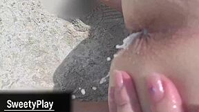 Chubby wife does outdoor anal milk enema creampie right on the beach