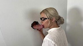 Blonde petite slut deepthroats then fucks random cock through gloryhole booth