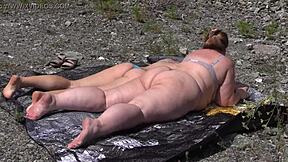 Two big ass lesbians grope juicy pussies outdoors in panties!