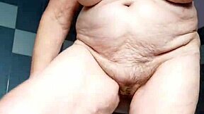 granny fucks her hairy pussy with a cucumber