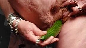 granny fucks her hairy pussy with a cucumber