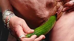 granny fucks her hairy pussy with a cucumber