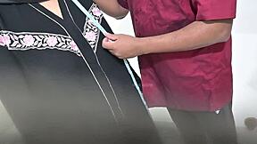 Doctor Examines Hijab-Clad Arab Patient