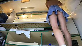 Blonde's upskirt panties slip revealing shaved pussy tease