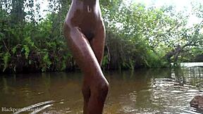 Attractive African Village Girl Bathes Skinny Body in River