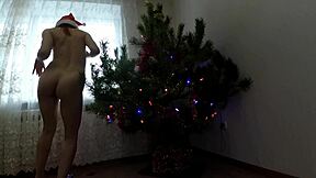 Why Does This Bitch Tease Her Pussy Dancing Around the Christmas Tree?