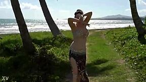 Hey, watch this sexy homemade belly dancer babe shake her big ass and natural tits wildly!