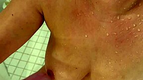 Amateur wife with big tits bathes under golden shower from old couple partner