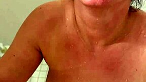 Amateur wife with big tits bathes under golden shower from old couple partner