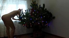 Why Does This Bitch Tease Her Pussy Dancing Around the Christmas Tree?