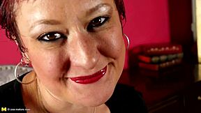 Short-Haired Redhead Mature Shoves Dildo Deep in Her Stockinged Pussy