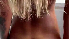 Monika Fox Strips Pink Bodysuit Revealing Shaved Pussy In Kitchen