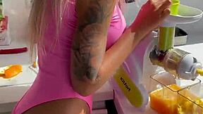 Monika Fox Strips Pink Bodysuit Revealing Shaved Pussy In Kitchen