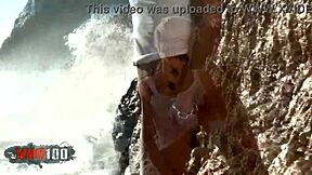 mysterious blonde nicky wayne strips bare by the crashing sea waves