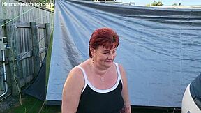filthy kiwi milf pisses publicly at campground with campers watching