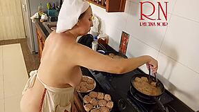 Nudist housewife bares all while cooking naked in kitchen
