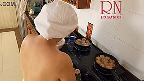 Nudist housewife bares all while cooking naked in kitchen