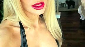 hey look at this woman in wetlook suit and leather boots