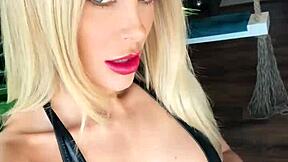 hey look at this woman in wetlook suit and leather boots